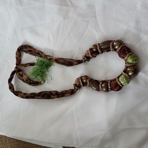 Long animal print, beaded necklace